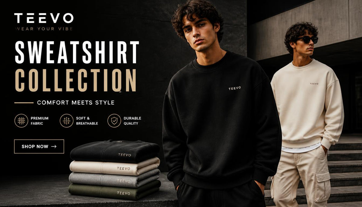 Promotional banner for the TEEVO sweatshirt collection, featuring two male models wearing crewneck sweatshirts. The model in the foreground wears a black sweatshirt, while the model in the background wears a cream-colored sweatshirt.